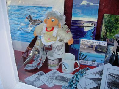 Madame Cholet hides in the gift shop window for the Womble Hunt