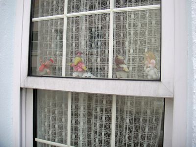 Wombles in the window of Elisabeth Beresford's house