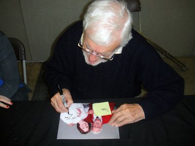 Bernard Cribbins signing his autograph in 2012