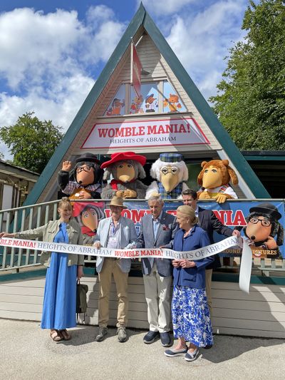 Marianne and Marcus Robertson with Andrew, Vanessa and Rupert Pugh and the Wombles, holding the opening ribbon