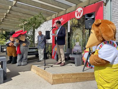 Rupert Pugh makes a speech, with Andrew Pugh and the Wombles watching