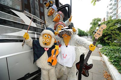 The Wombles with their tour bus